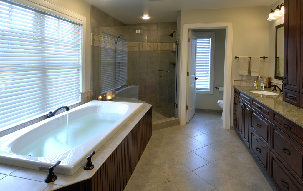 Baldridge bathroom with tub and shower